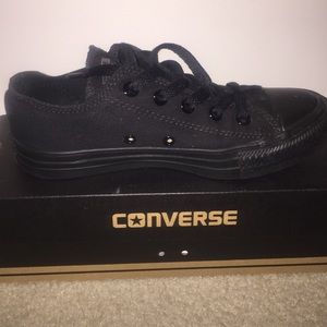 All black low top Converse