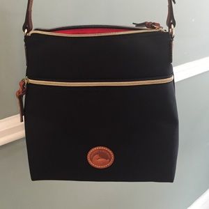 Black vinyl Dooney & Bourke Cross body bag
