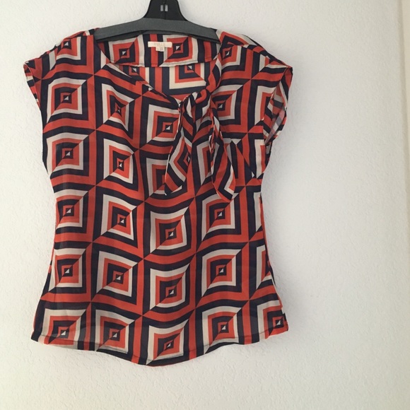 Orange and navy geometric print blouse