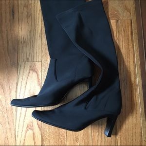Black knee length heeled boots