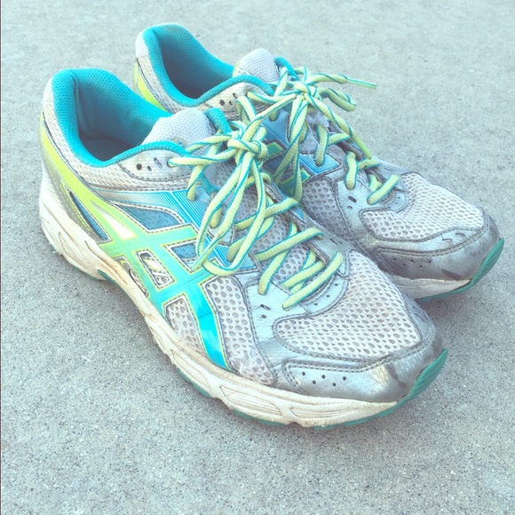 Asics blue, green, grey, and white tennis shoes