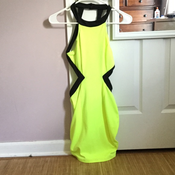 Backless neon green and black dress