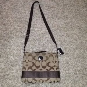 Brown Coach crossbody purse