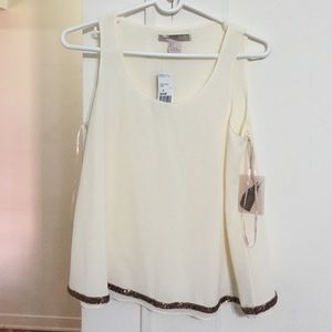 Woven sleeveless top in cream