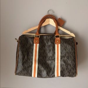 Gently used Michael Kors duffle bag