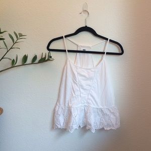 Spaghetti strap peplum  tank with eyelets