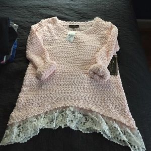 Light pink sweater with lace trim