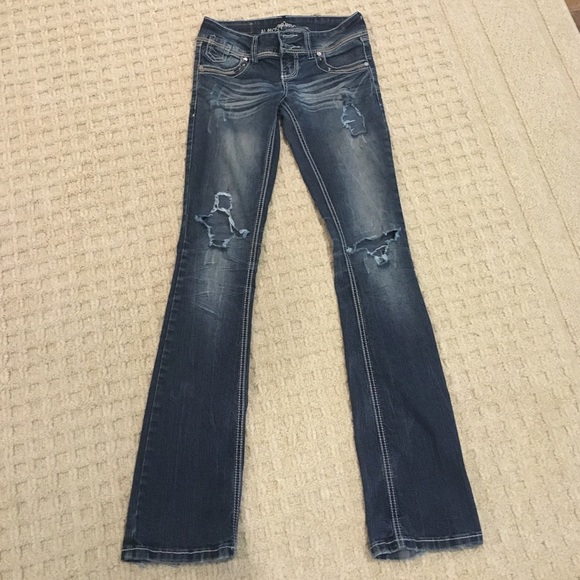 Distressed Almost Famous jeans