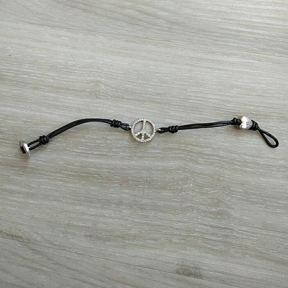 Fossil leather chord peace sign bracelet