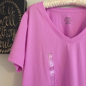 NWT Reebok light pink/purple v neck play dry shirt