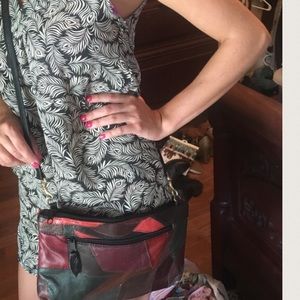 Multi color cross body bag.
