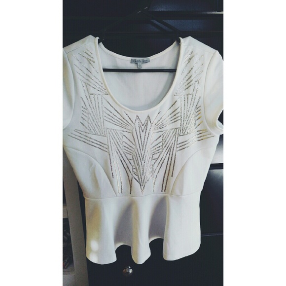 Peplum top with silver glitter design