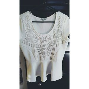 Peplum top with silver glitter design