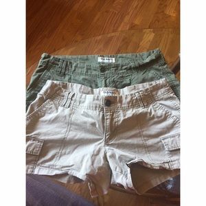 Two pairs of cargo style women's shorts.