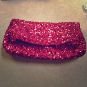 Medium sized never used glittery hot pink clutch