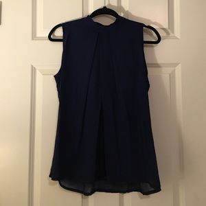 Navy blue sleeveless top.