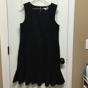 Black eyelet dress with flounce