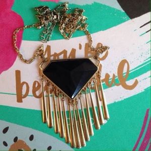 Black long pendant necklace with gold tassels