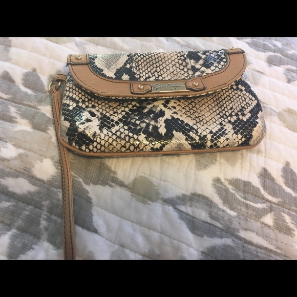 Snakeskin print wristlet by Jessica Simpson