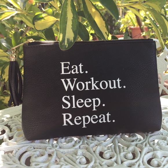 Black clutch or make-up bag.