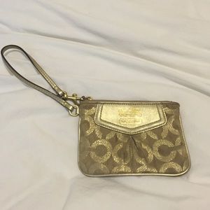 Gold coach wristlet