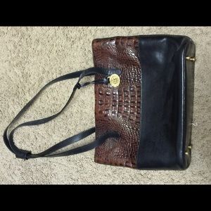 Brahmin purse with single pocket opening.