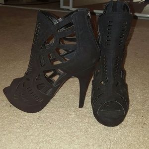 Black zip up high heels