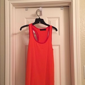 Orange tank with racer back and red trim