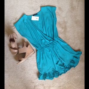NWT‼️ Turquoise Romper. Size M.