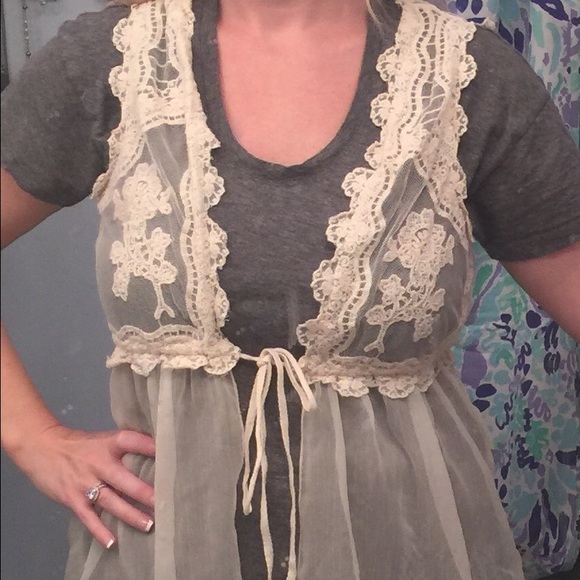 Romantic lace tie vest.