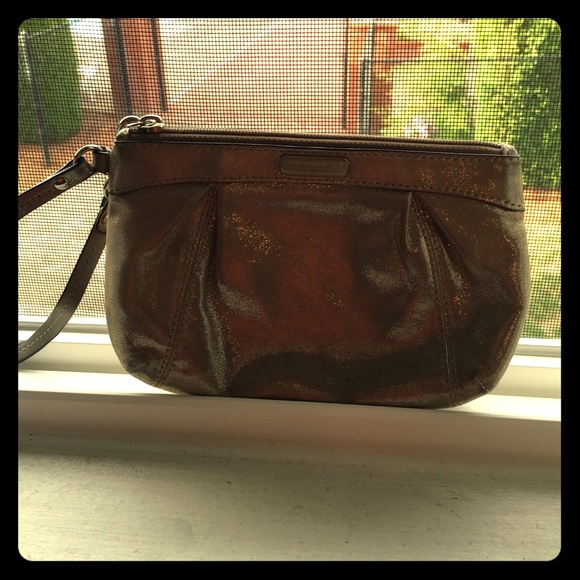 Gold shimmer coach wristlet.