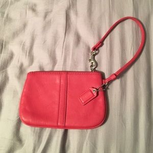 Melon colored Coach Wristlet