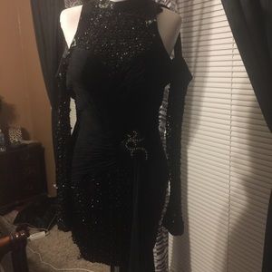 Black sequence shoulder less evening dress
