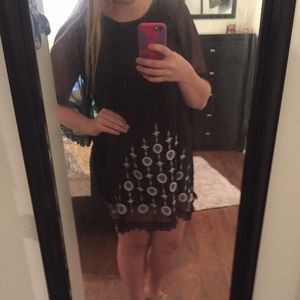 Black dress with lace and embroidered detail