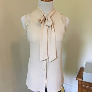 Sleeveless tie-neck blouse