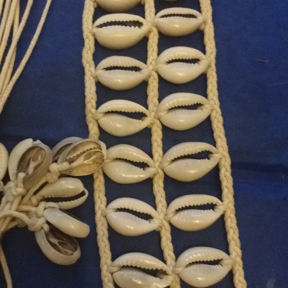 Sea shells and wooden barrels Mayan belts
