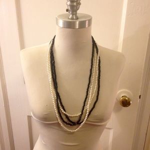 Two faux pearl necklaces