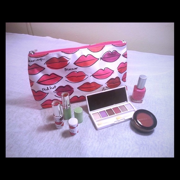 Make up bag, 2 lip colors, 1 blush, 1 eye palette