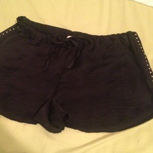 Black shorts with gold studs