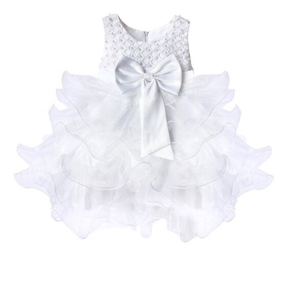 Other - White ruffled dress with beading and bows!