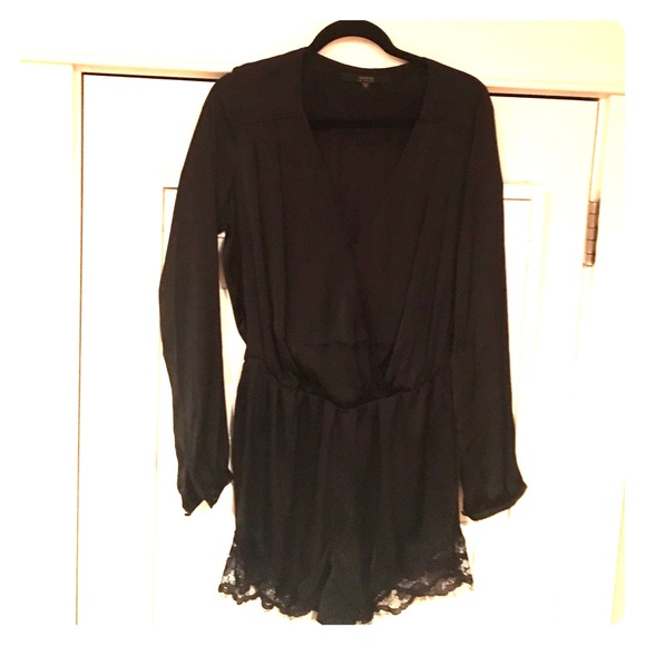 Guess brand low cut yet classy black romper