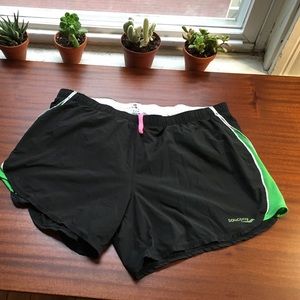 Black and green athletic shorts