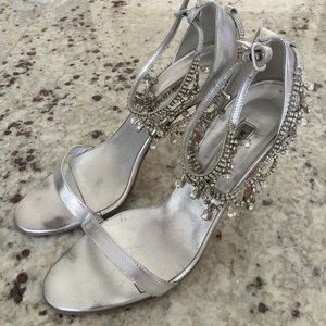 Crystal Manolo's size 9 with a 4.25" heel.