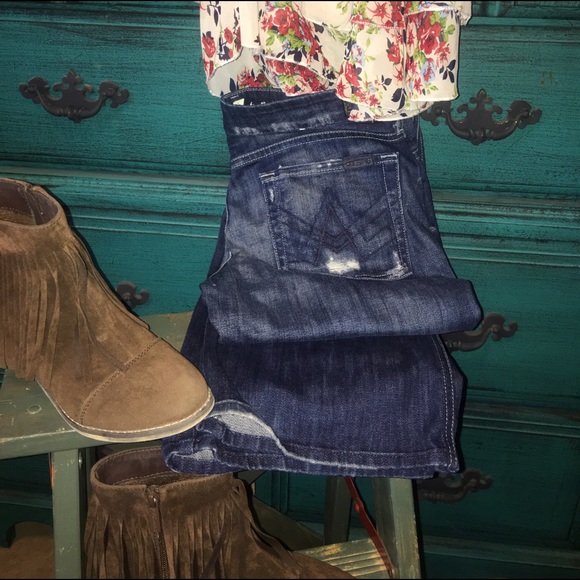 ***SOLD********7FAM "A" pocket distressed jeans.