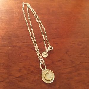 Waxing poetic necklace with charm