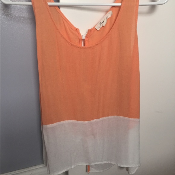Orange and white color block tie back tank