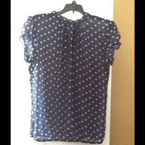 Navy and white pokadot top