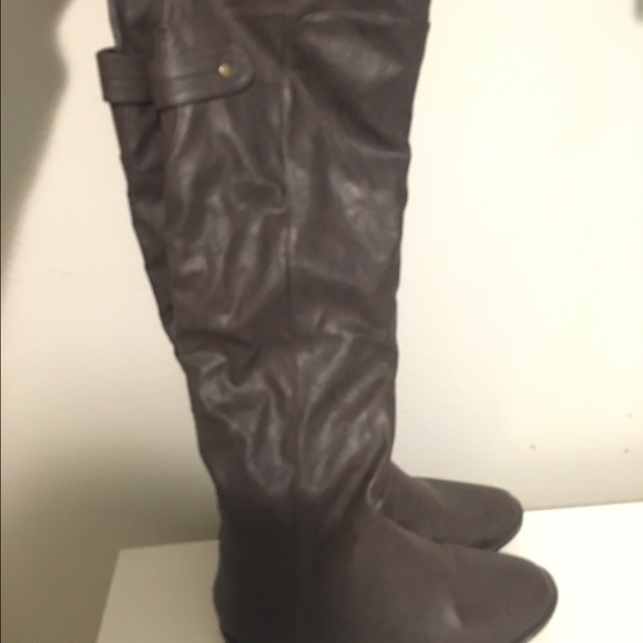 Under the knee brown boots