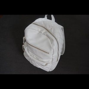 White quilted backpack