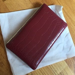 L Erickson opera wallet